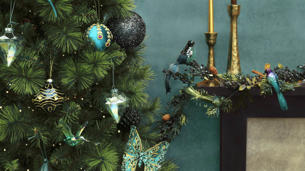 Tree with striking peacock blue and gold decorations, also rustic gold candlesticks and ornate bird ornaments in peacock blue made of feathers and sequins
